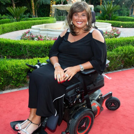 Abby Lee Miller uses a wheel chair.
